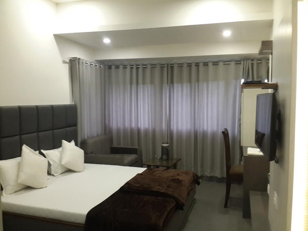 Hotel Oasis Bombaim Quarto foto