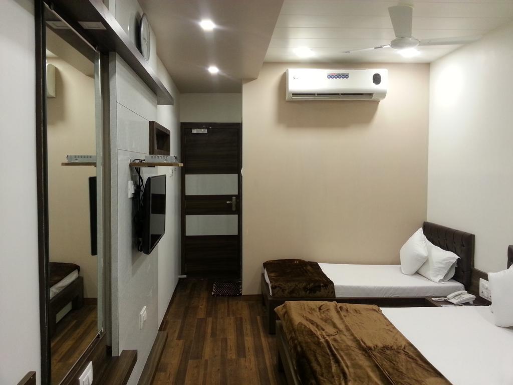 Hotel Oasis Bombaim Quarto foto