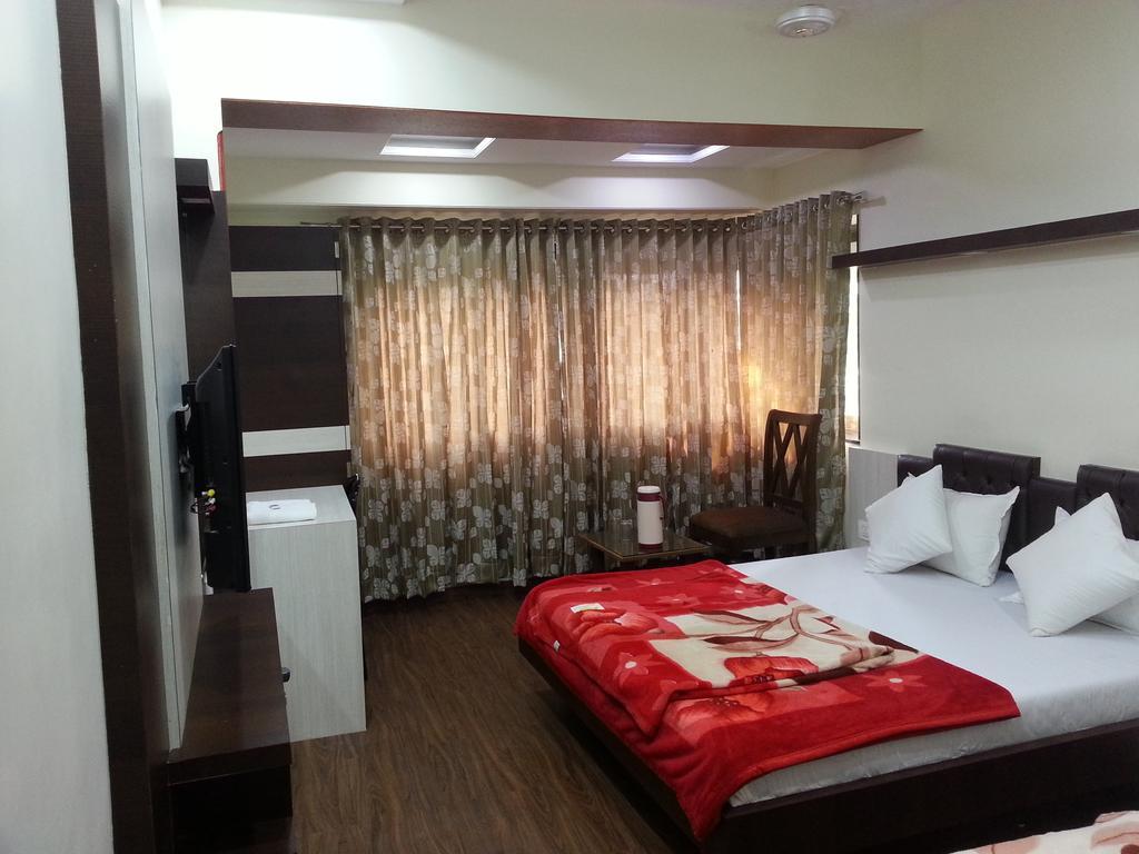 Hotel Oasis Bombaim Quarto foto